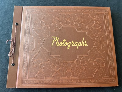 Antique Leather Bound Embossed Photograph Book Black Background-image
