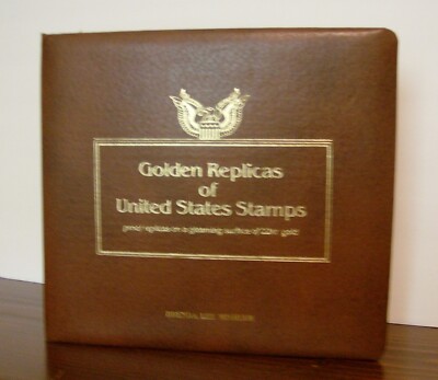 GOLDEN REPLICAS OF U. S.  STAMPS * 42 TOTAL IN LEATHER BOUND ALBUM * 1980 & 1981-image
